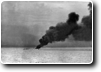 Japanese Ammunition boat hit and sinking.