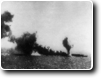 Japanese Carrier on fire and with a near miss